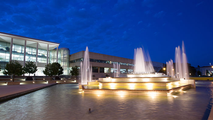 Night view of the fountain outside Meyer Library