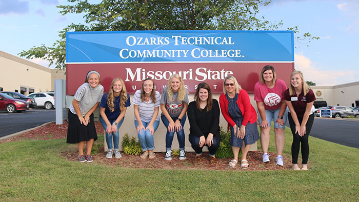 Lebanon elementary education cohort standing in front of the OTC/MSU sign on the Lebanon campus. 