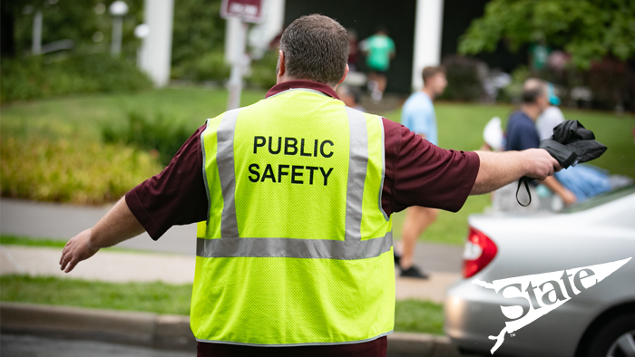 a public safety officer guiding traffic